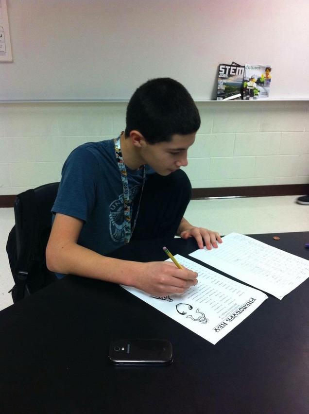 Cole Clanin works on his English homework.