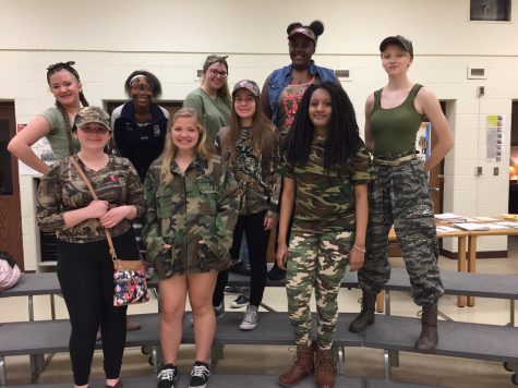 Symphonic choir students participate all dressed up in their camouflage gear. 