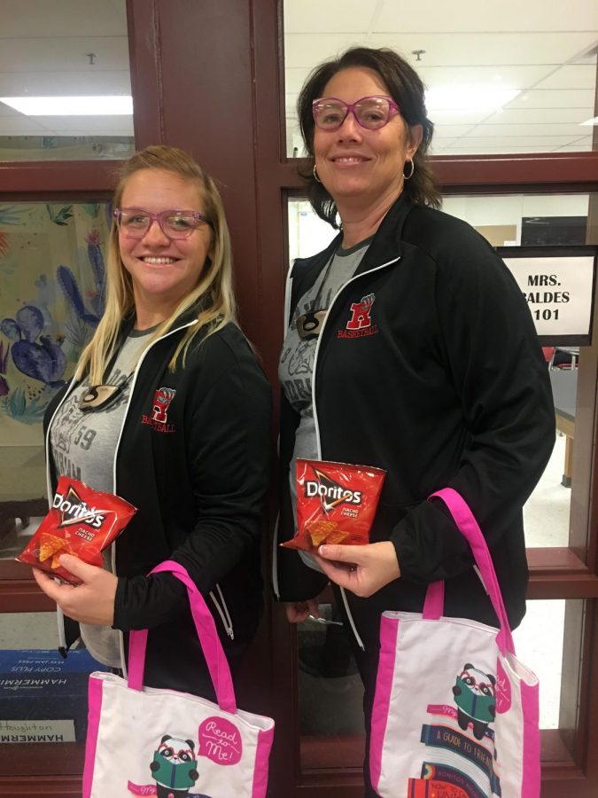 Teachers Angela Houghton and Jennifer Baldes show off their school spirit.
