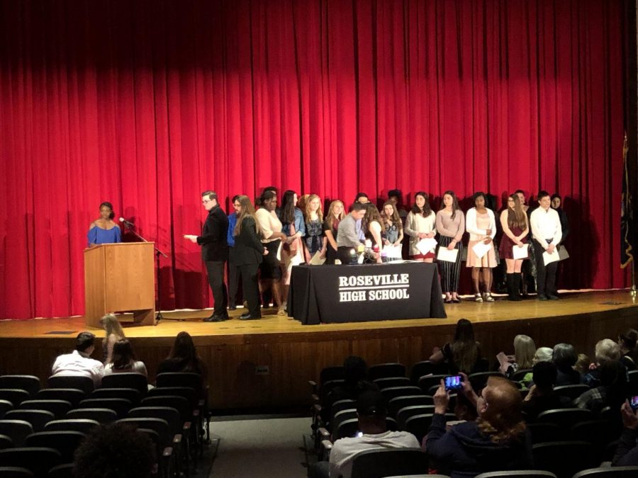 The 35 new members of NHS are now inducted.