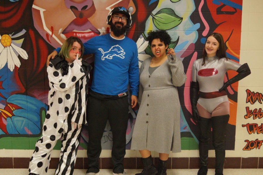Teacher+Jeff+Awwad+and+students+dress+up+in+various+costumes+for+Halloween.