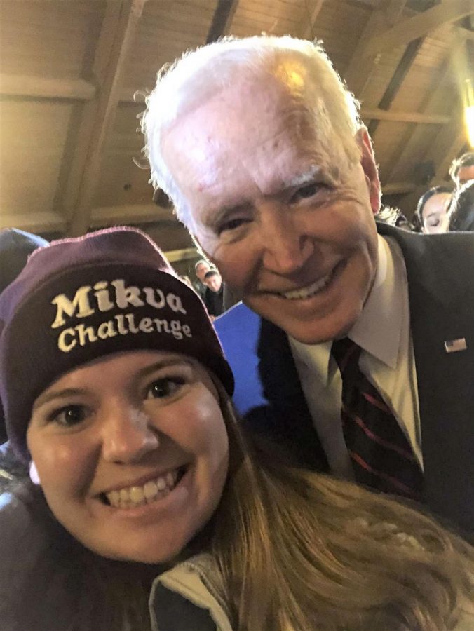 During the Iowa caucus, senior Meghan VanDamme takes a picture with Democratic presidential nominee Joe Biden.