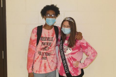 Junior Myles Spencer-Walker and senior Madison Milot show their school spirit for  On Wednesdays we wear pink.