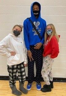 To kick off spirit week, seniors Hayleigh Klemm, Diontae Russell-Johnson and Alyssa Dix dress up in their pajamas.